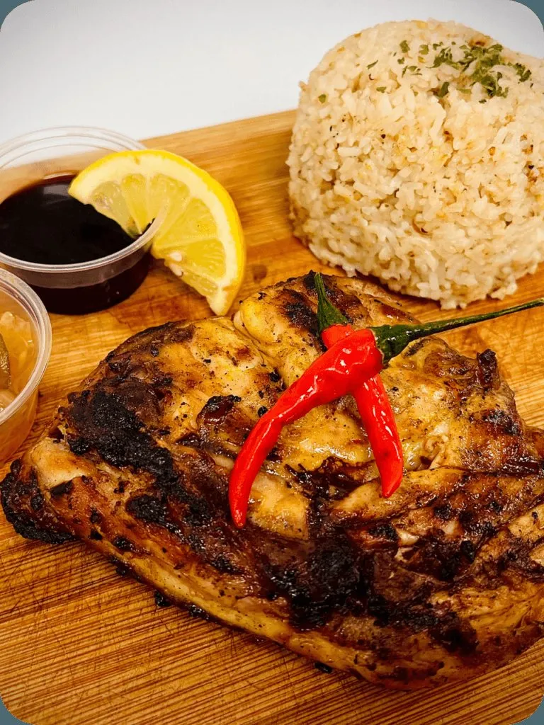 Chicken inasal with garlic rice and dipping sauce