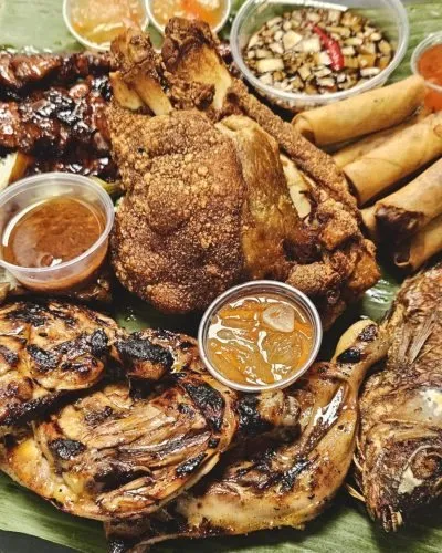 Bikong's Platter with crispy pata, pork barbecue and grilled fish