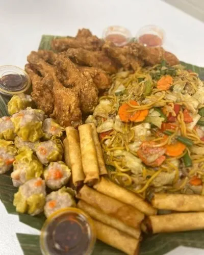 Laureat Platter with pancit, fried chicken, spring rolls and siomai